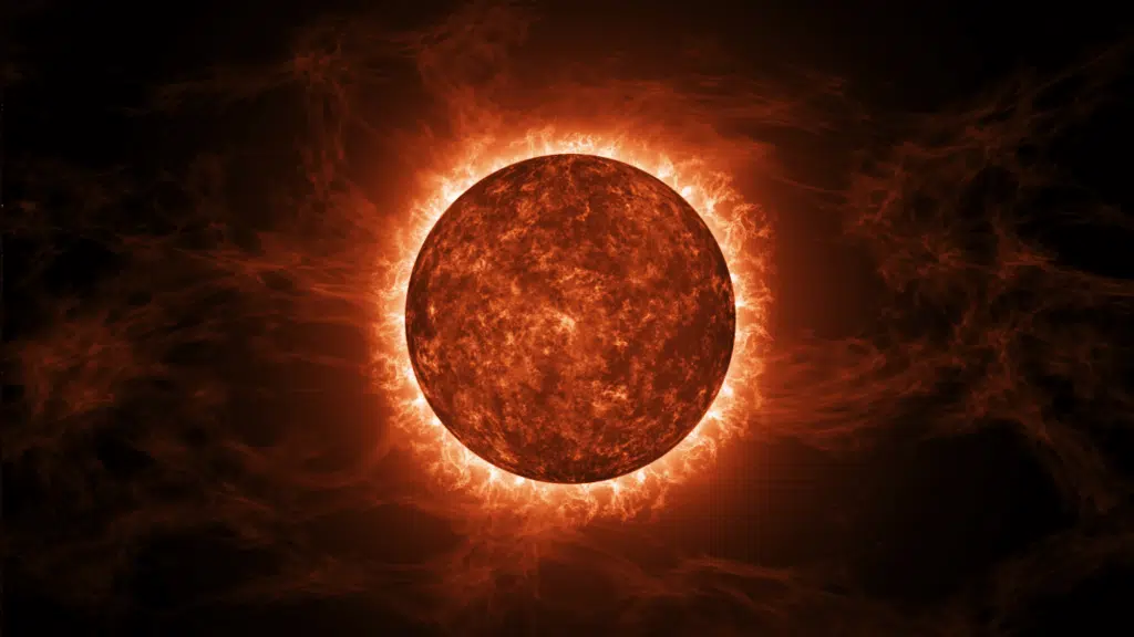Betelgeuse, the red supergiant starred celestial body emitting intense light and surrounded by wispy, turbulent plasma against a dark background. (1)