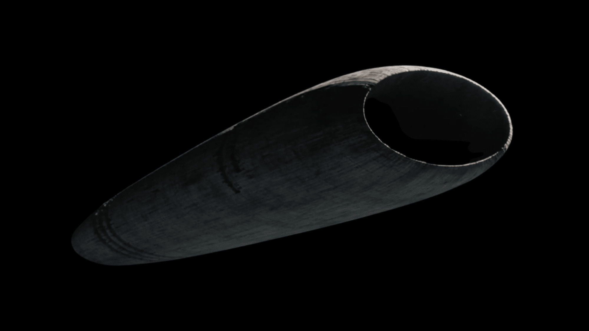 An image of Heighliner spaceship from the movie Dune against a black background.