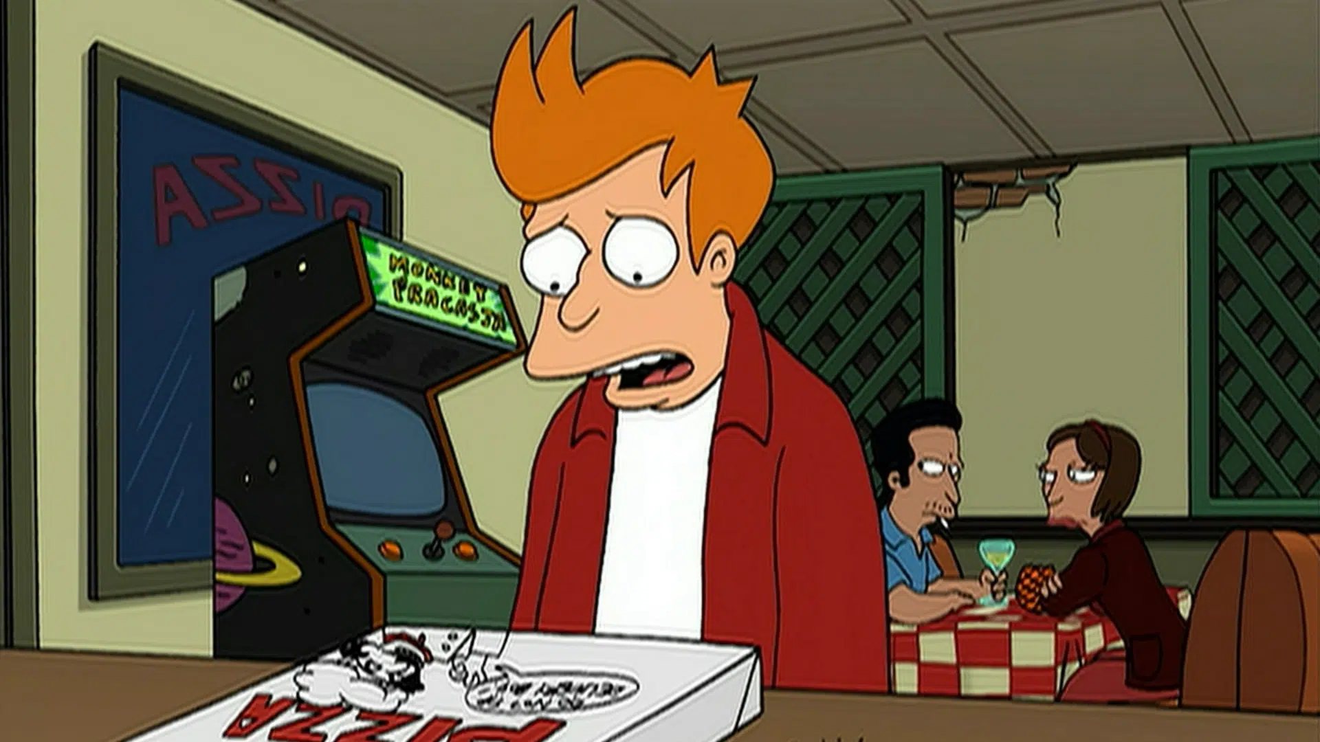 Fry from Futurama looks distressed while standing over a Panucci's pizza box near an arcade machine