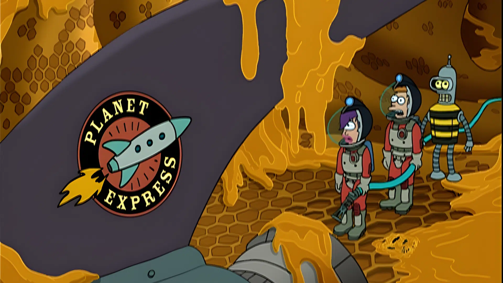 Leela, Fry in a spacesuit, and Bender dressed as a bee stand on a honeycomb with dripping honey beside a Planet Express object