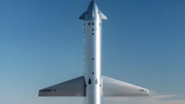 SpaceX Starship V3 set against a clear blue sky