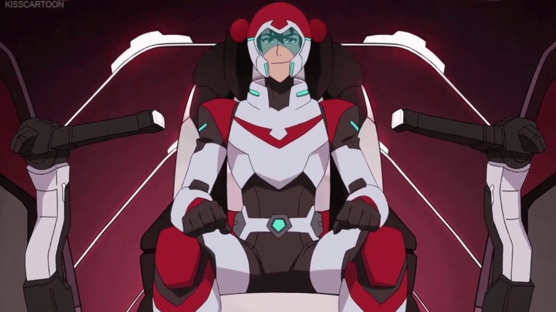 keith from Voltron Legendary Defender sits focused in the pilot's seat of a high-tech cockpit with dark red and white accents