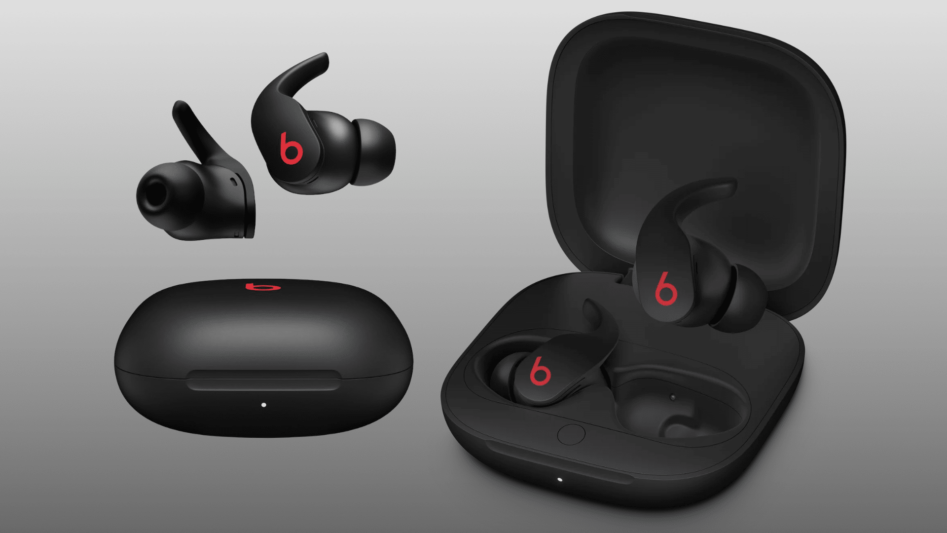 Black Beats Fit Pro wireless earbuds displayed with their charging case, both open and closed, against a gray background.