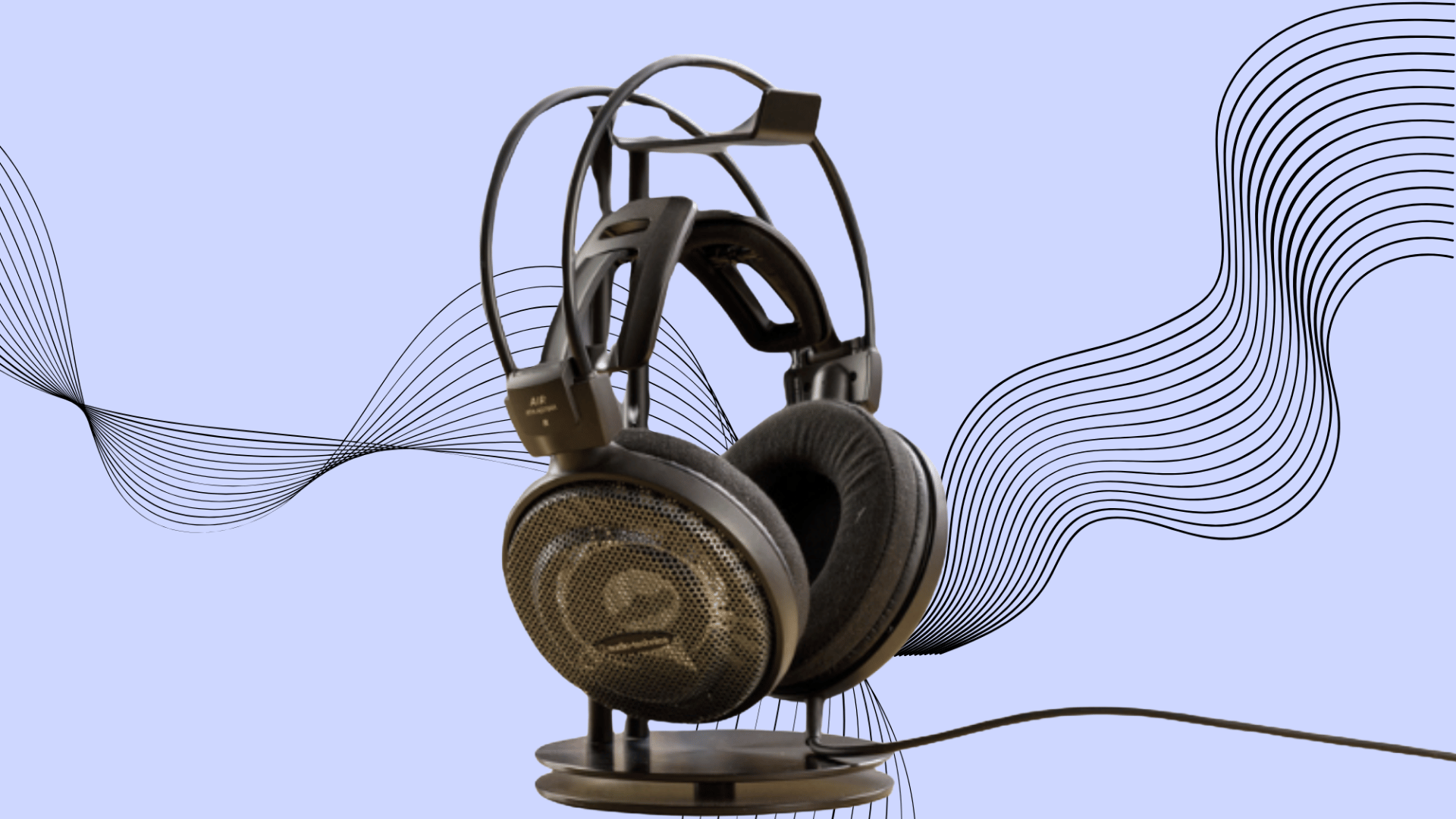 Audio-Technical ATH-AD700X Light beige open-back headphones with honeycomb grille. Wide soundstage design for gaming and music.