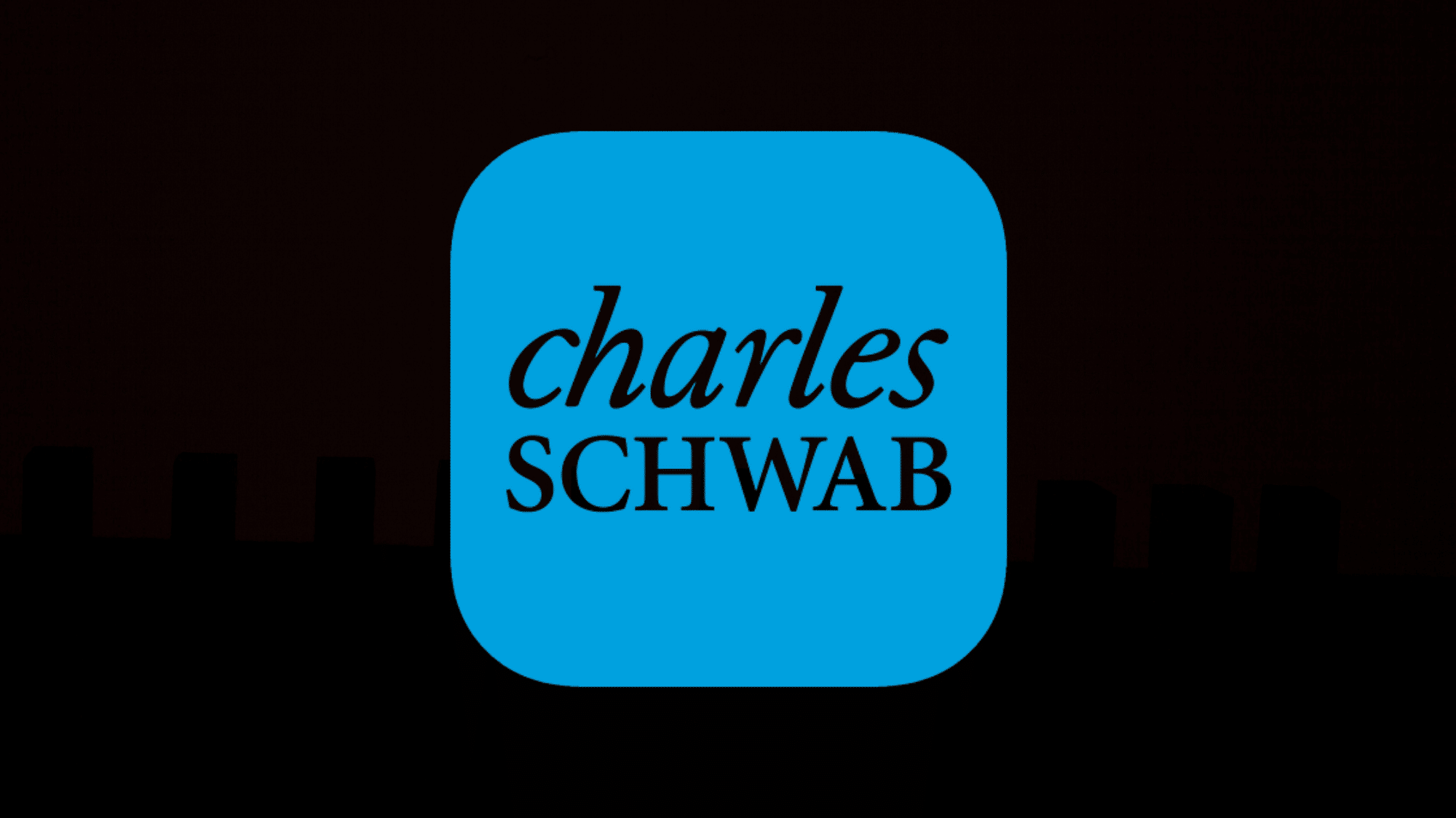 Charles Schwab trading and investment app logo on a black background