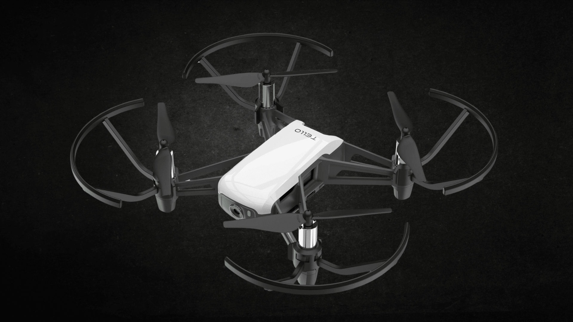 Ryze Tello drone with propellers and camera is shown against a black background