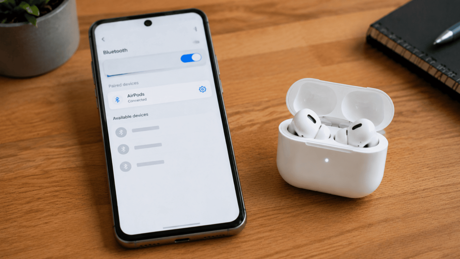 android Bluetooth screen showing AirPods listed as connected under paired devices
