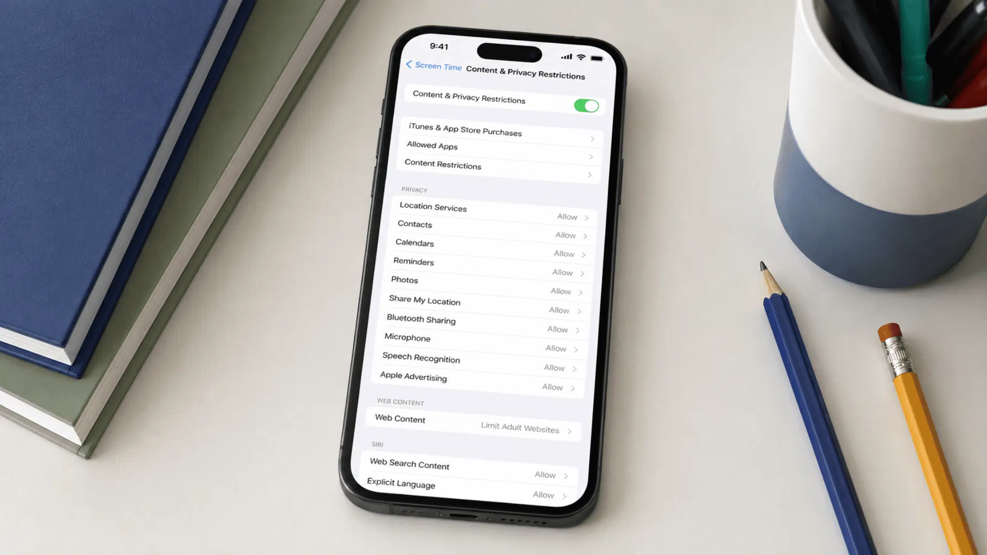 Child&rsquo;s iPhone displaying active Screen Time content restrictions
