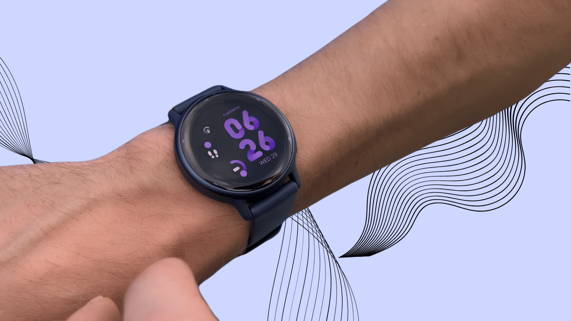 Garmin Vivoactive 5 worn on a wrist with a purple digital display
