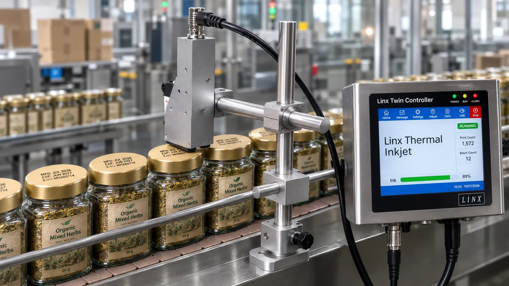industrial thermal inkjet printer marking labels on bottles in production line