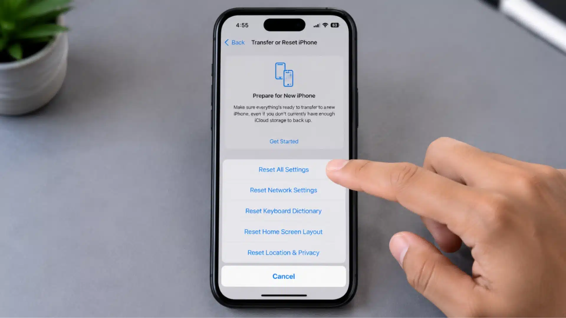 iPhone showing Reset All Settings option in Settings menu during camera troubleshooting steps
