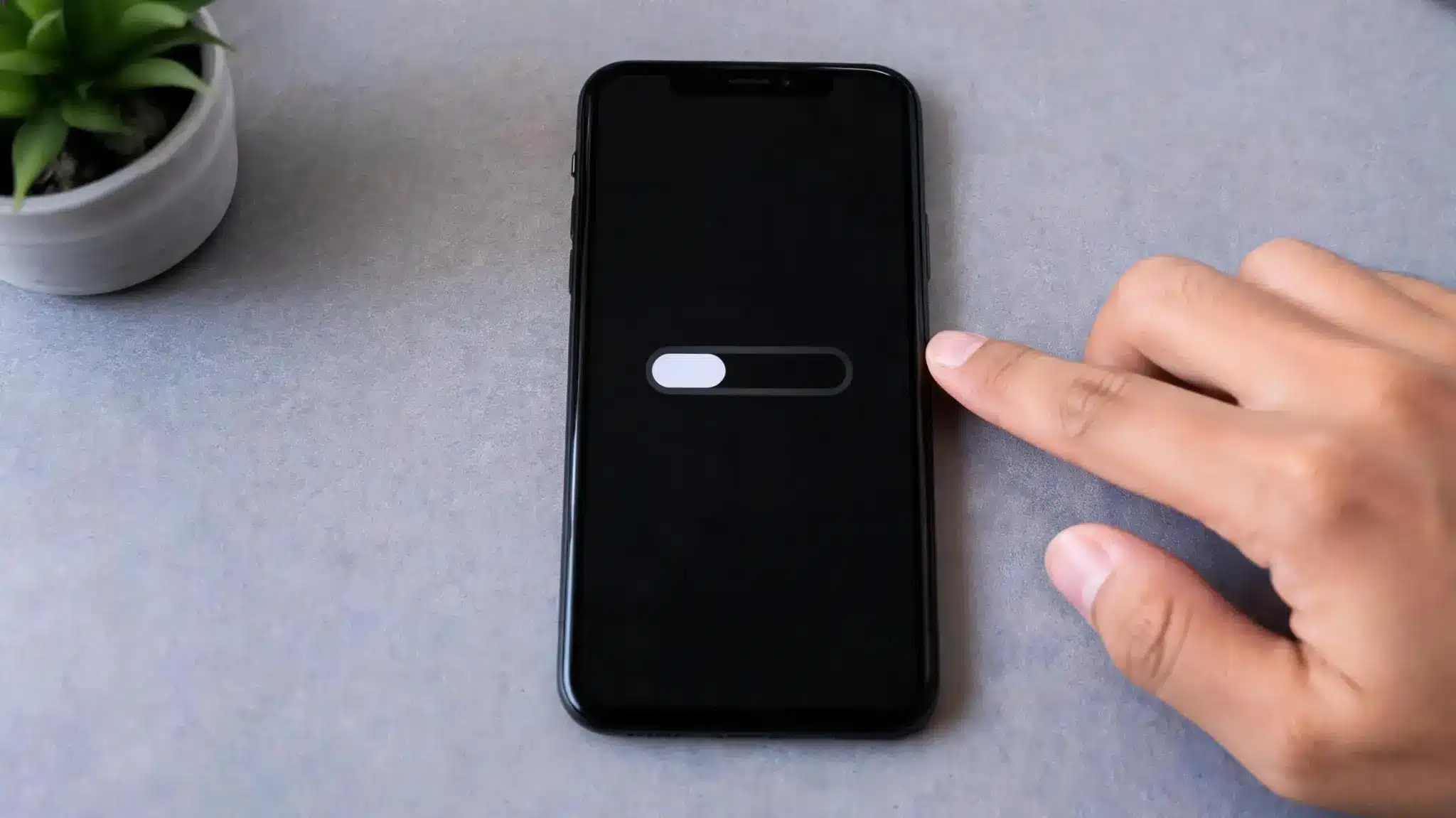 iphone showing shutdown screen during camera troubleshooting restart process