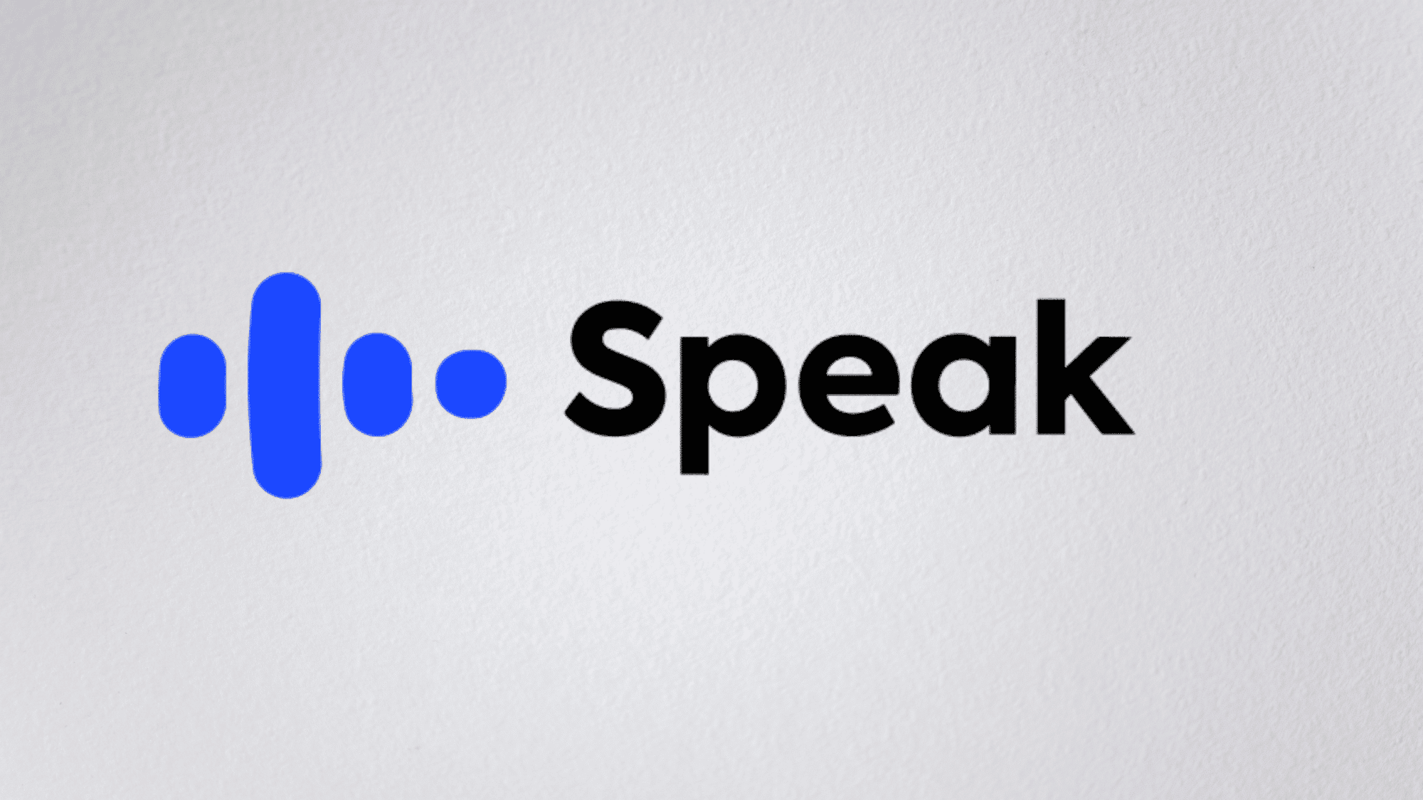 Speak language learning app logo with black text and yellow speech bubble icon on a white background.